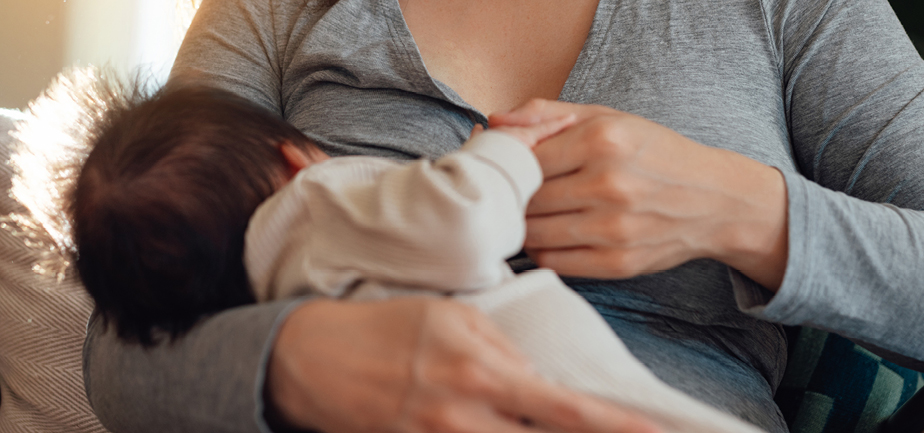 woman holding baby