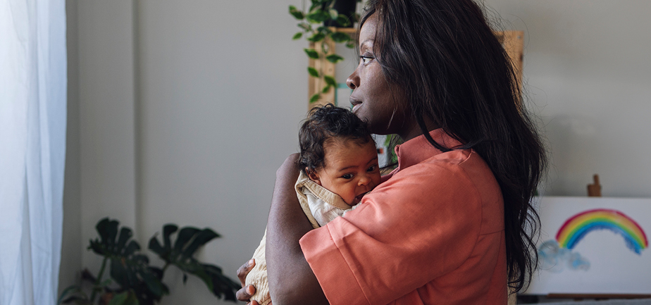new mom holding baby