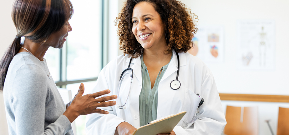 Doctor and Patient Discussing Healthcare in a Clinic
