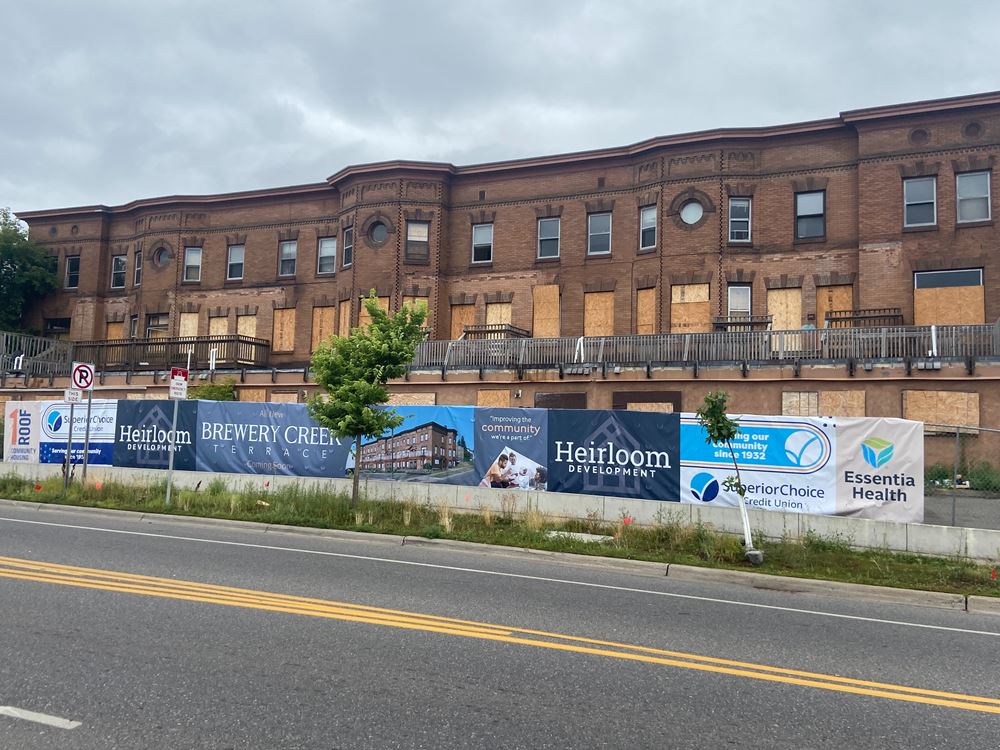 brownstone building looking disheveled