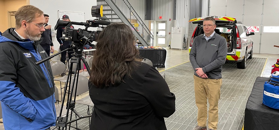 Dr. Chris Anderson does a TV interview