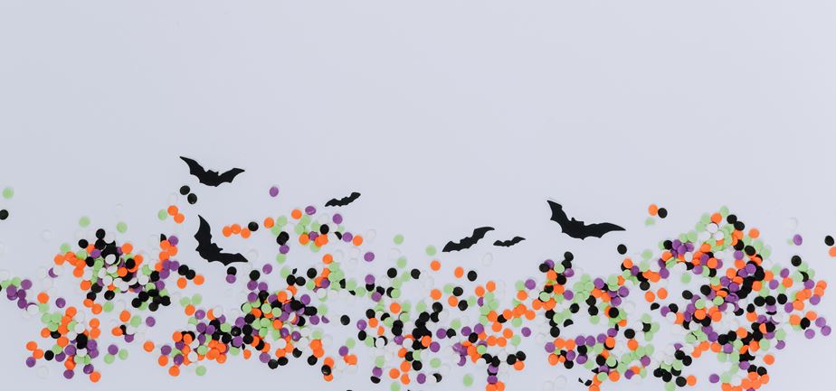 black bats and green, orange and purple confetti