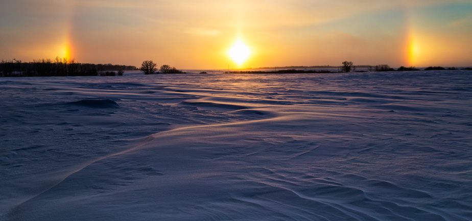 outdoor winter scene with sun dog