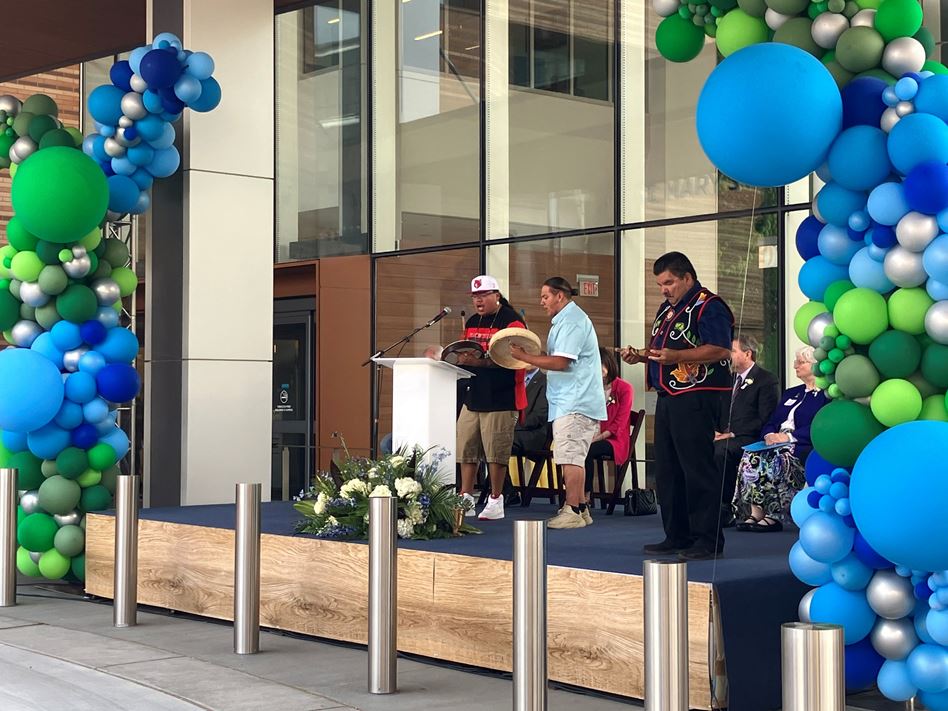 Three men playing instruments at VNL Opening ceremony
