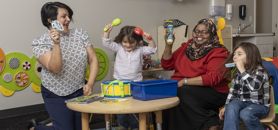 Soma Rivera and her daughters, Alexandra Sofia Heyen and Richell Sofía Heyen, pose for a photo with Jasmin Child Care and Preschool founder Rhoda Elmi