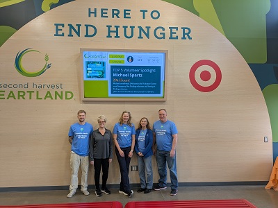 Essentia volunteers in blue T-shirts