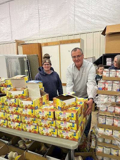 Essentia donating food