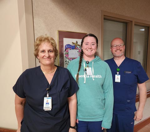 Three Essentia colleagues smiling